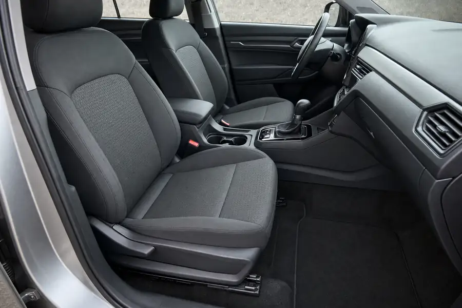 Freshly detailed car interior with spotless seats and vacuumed carpet mats